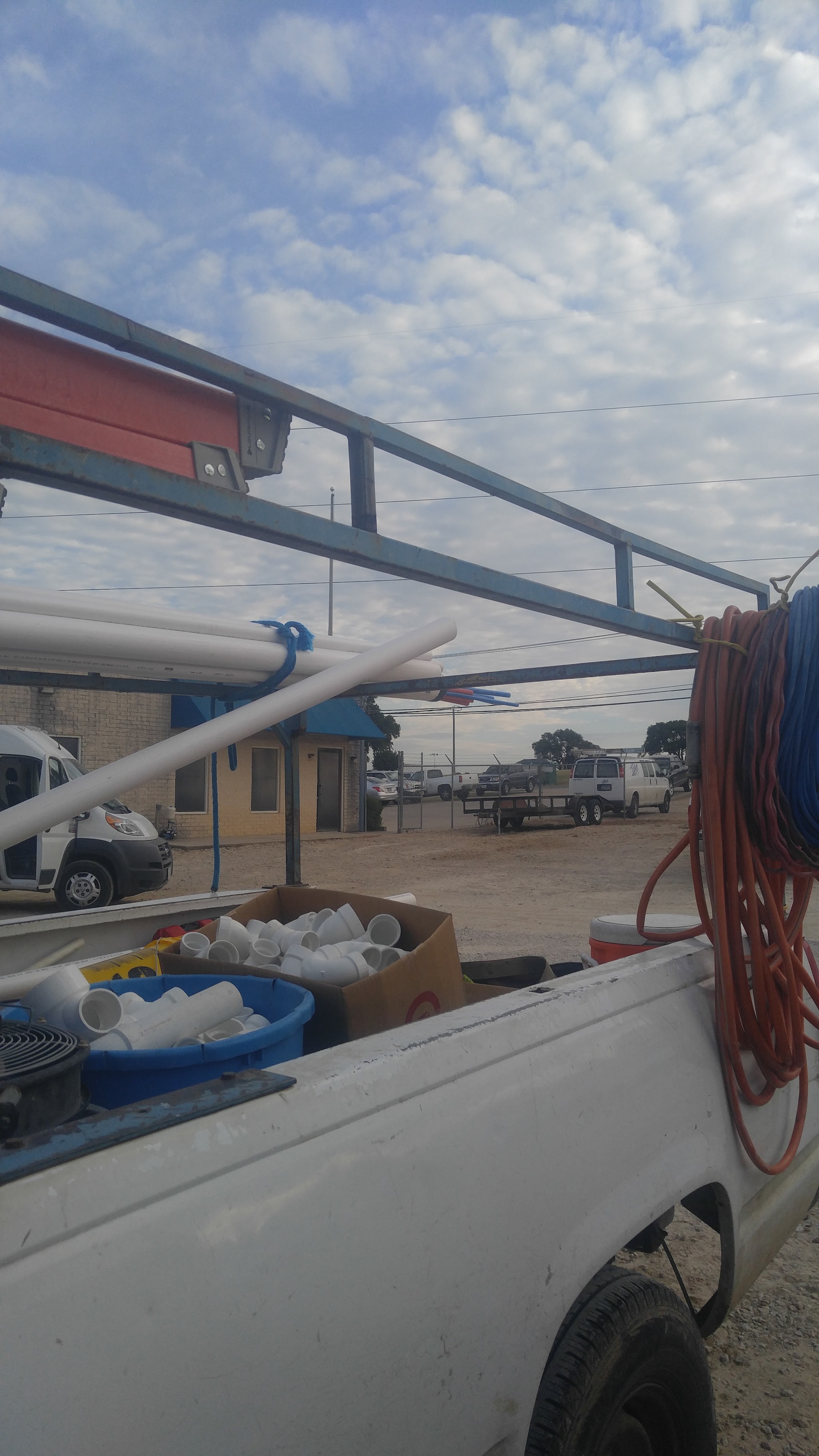 Cooper & Bright Plumbing service vehicle loaded with equipment